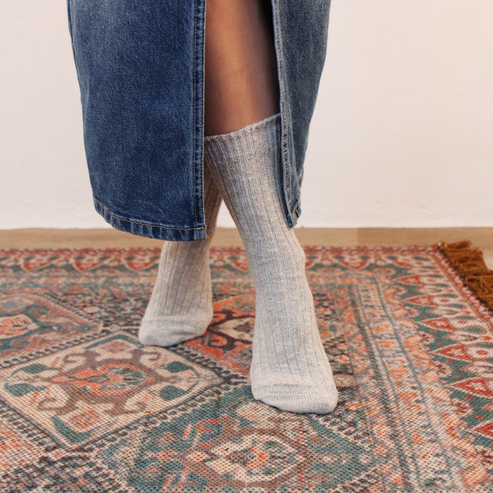 woman wearing grey melange cotton socks 